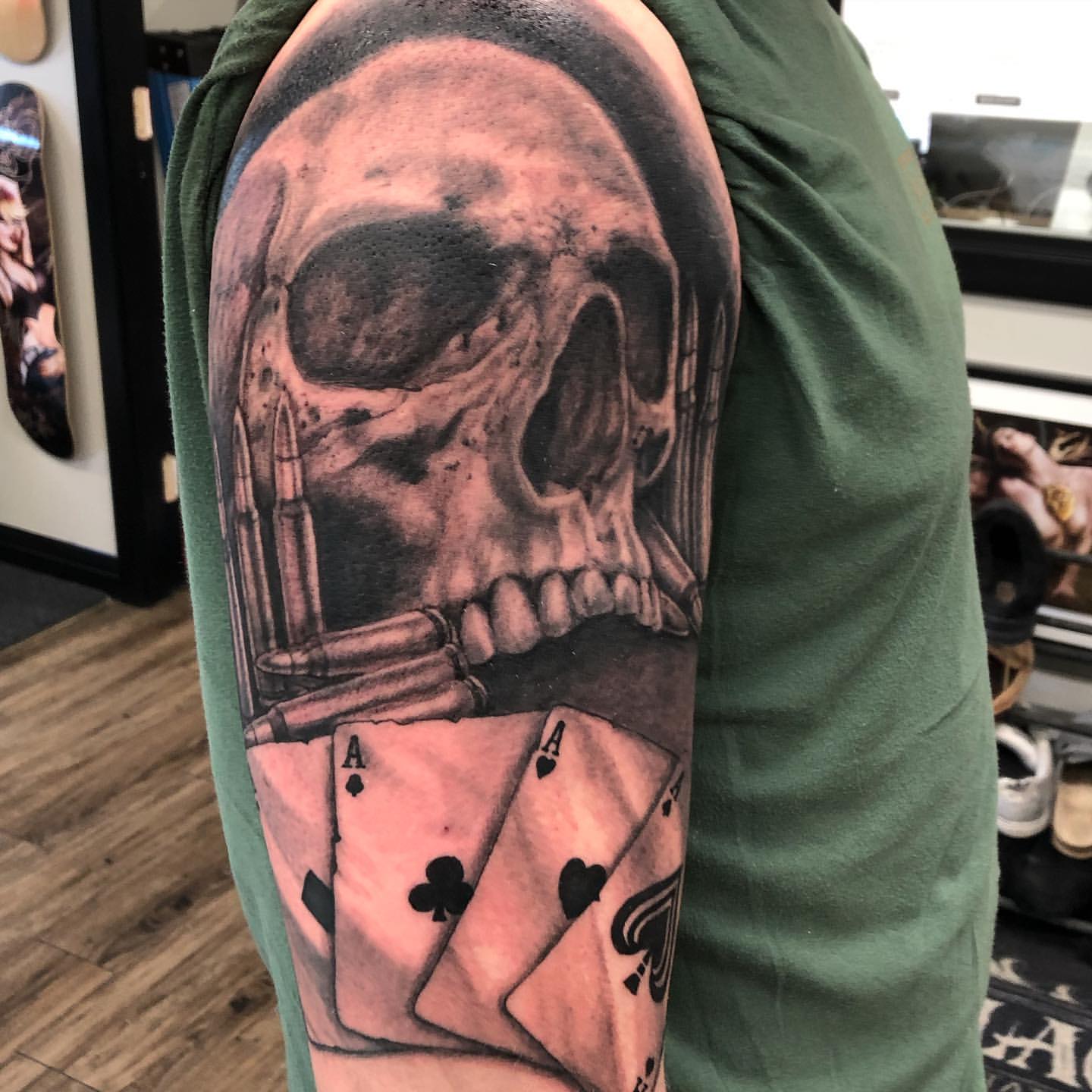 Skull, Cards and Bullets Tattoo by Steve Hayes at Black Gold Tattoo Co in Edmonton Alberta Canada