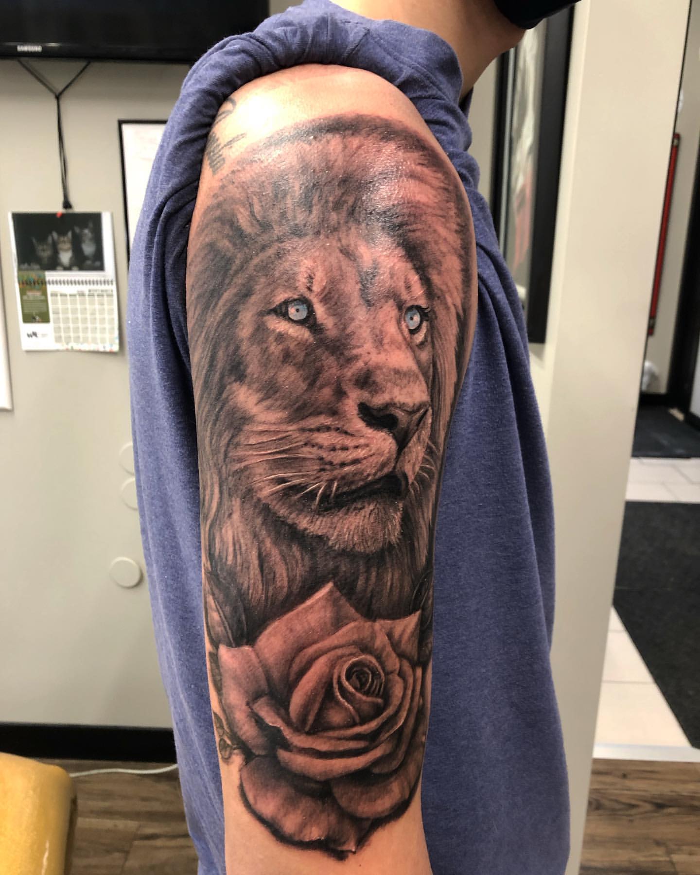 Lion and Rose Tattoo by Steve Hayes at Black Gold Tattoo Co in Edmonton Alberta Canada