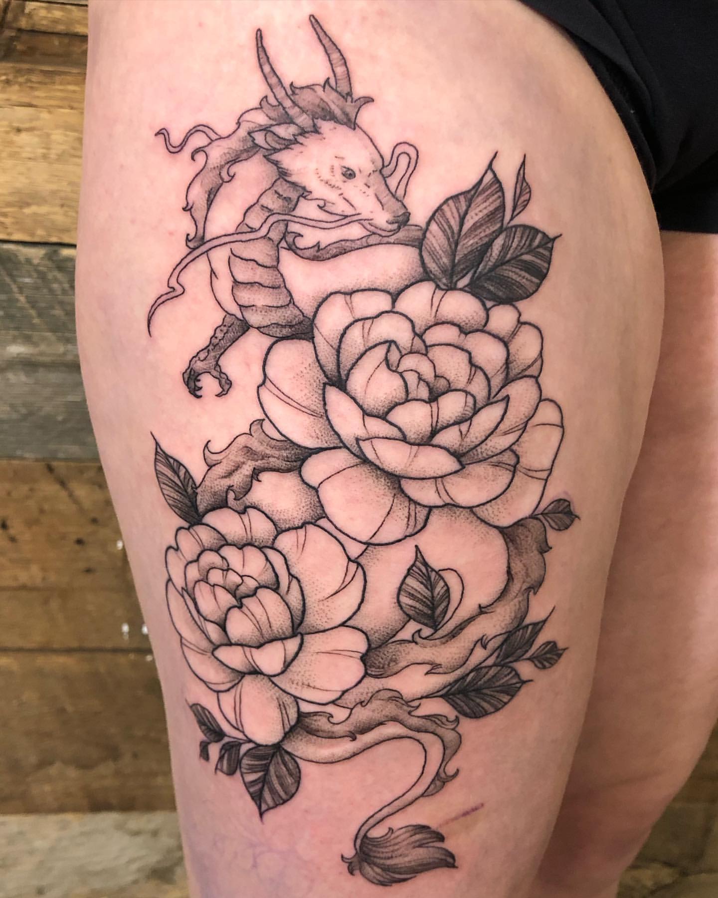 Dragon and Floral Tattoo by Vanessa Spezowka at Crimson Empire Tattoo in Edmonton Alberta Canada