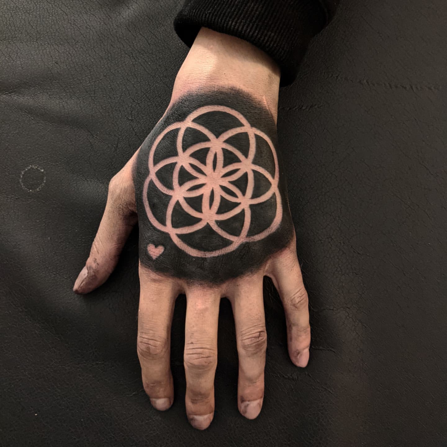 Geometric Hand Tattoo by Amber Strange at Black Gold Tattoo Co in Edmonton Alberta Canada