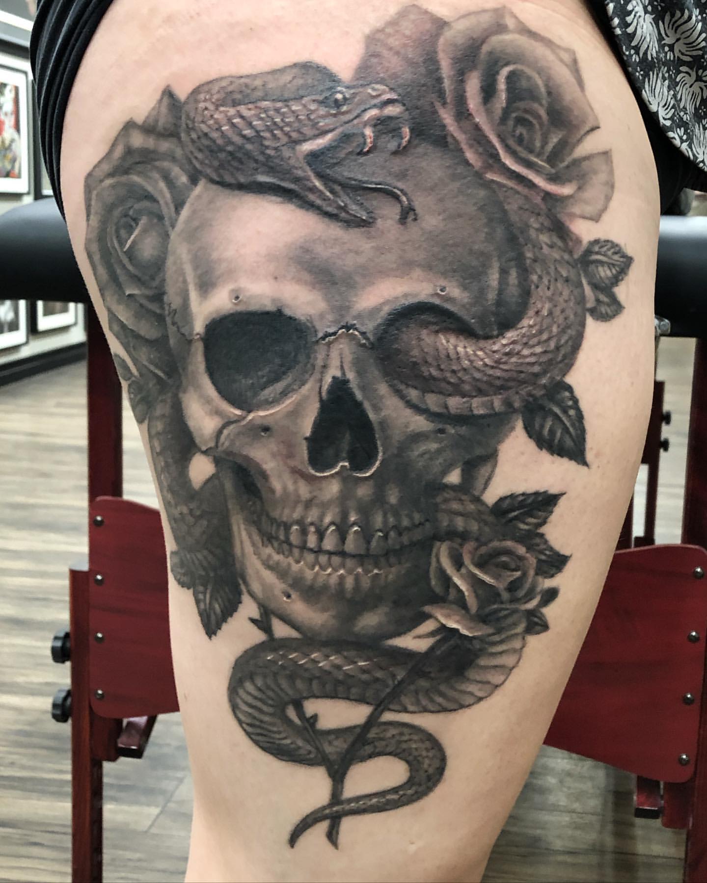 Skull, Snake and Roses Tattoo by Steve Hayes at Black Gold Tattoo Co in Edmonton Alberta Canada