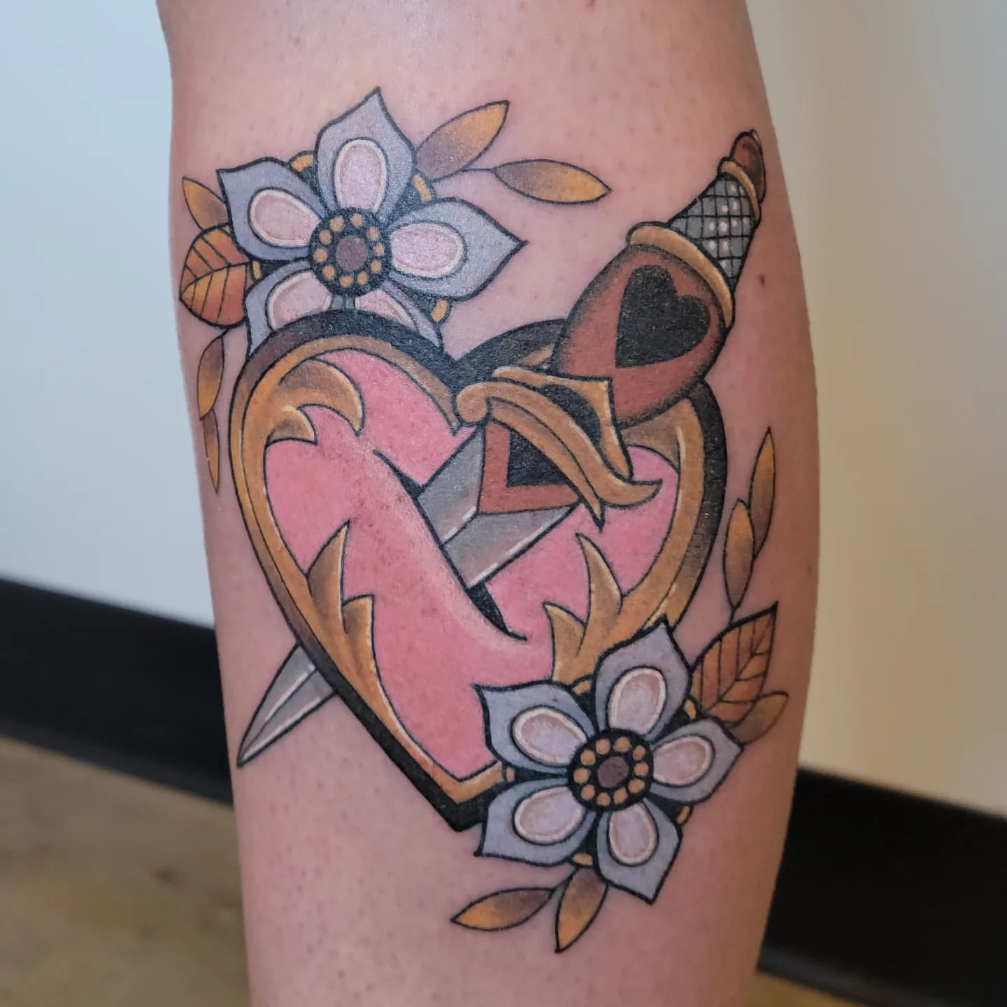 Dagger and Heart Tattoo by Sheila Anderson at Crimson Empire Tattoo in Edmonton Alberta Canada