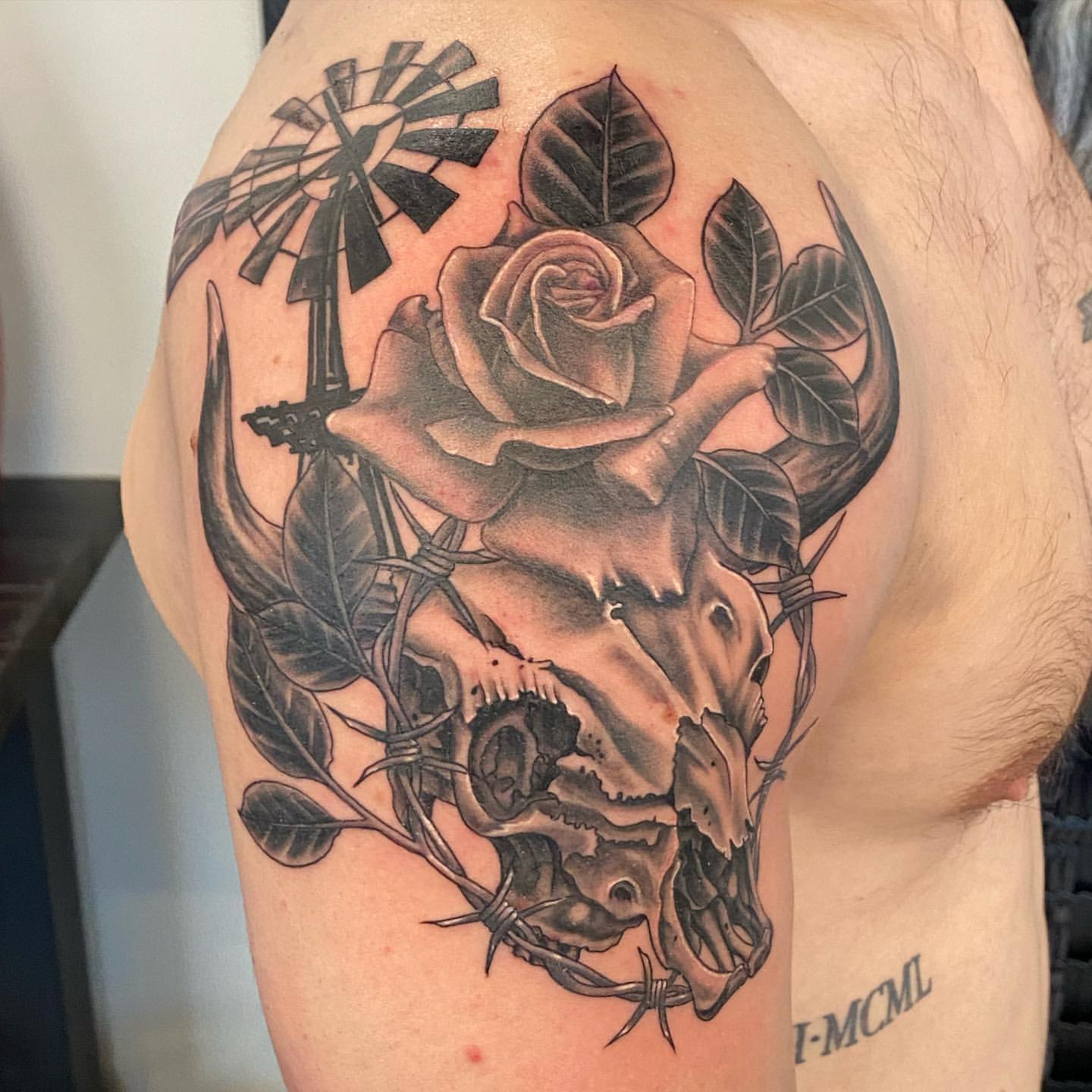 Skull, Rose and Barbed Wire Tattoo by Dale Moostoos at Crimson Empire Tattoo in Edmonton Alberta Canada