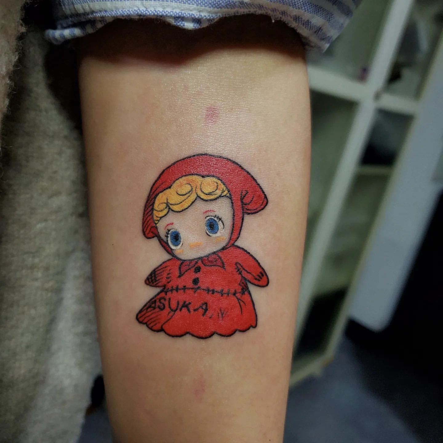 Doll Tattoo by Ian Wang at Black Gold Tattoo Co in Edmonton Alberta Canada