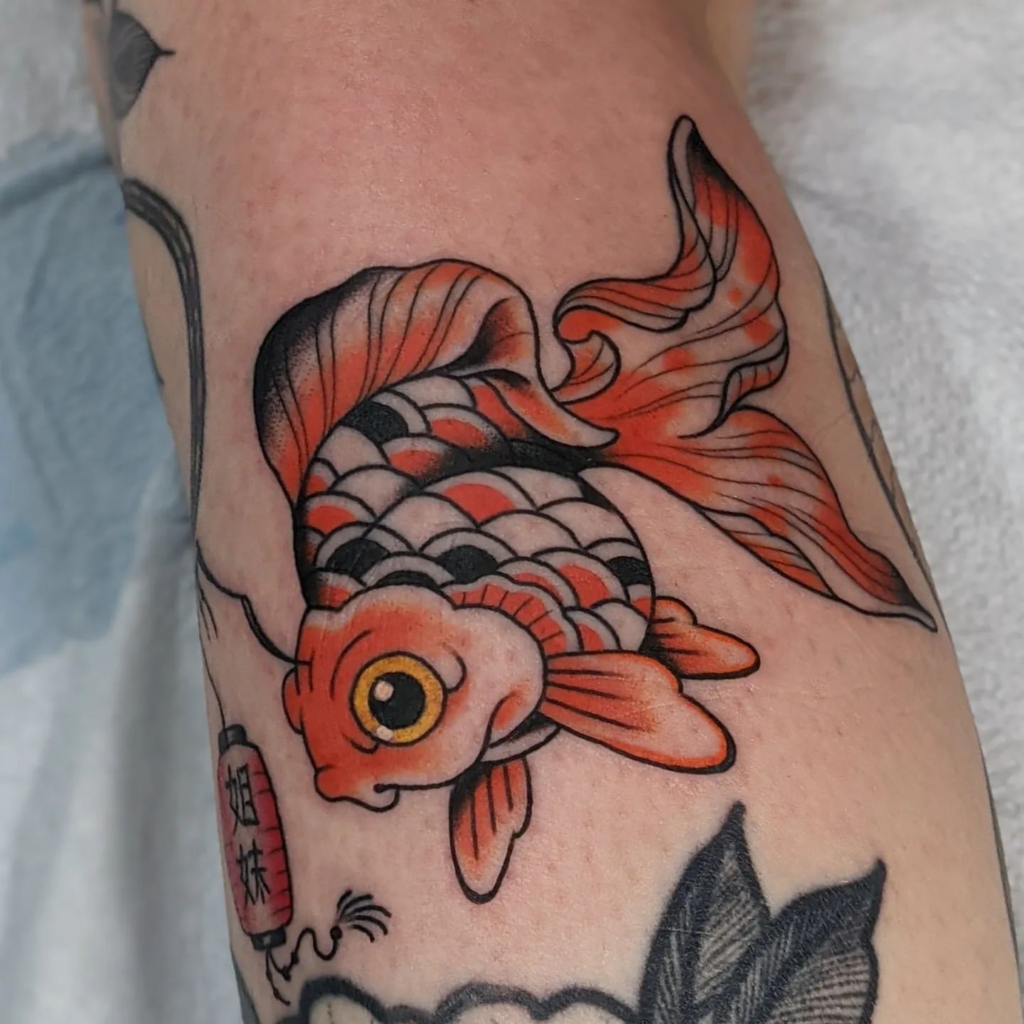 Koi Fish Tattoo Chris Benson at Silver Ghost Tattoo in Edmonton Alberta Canada