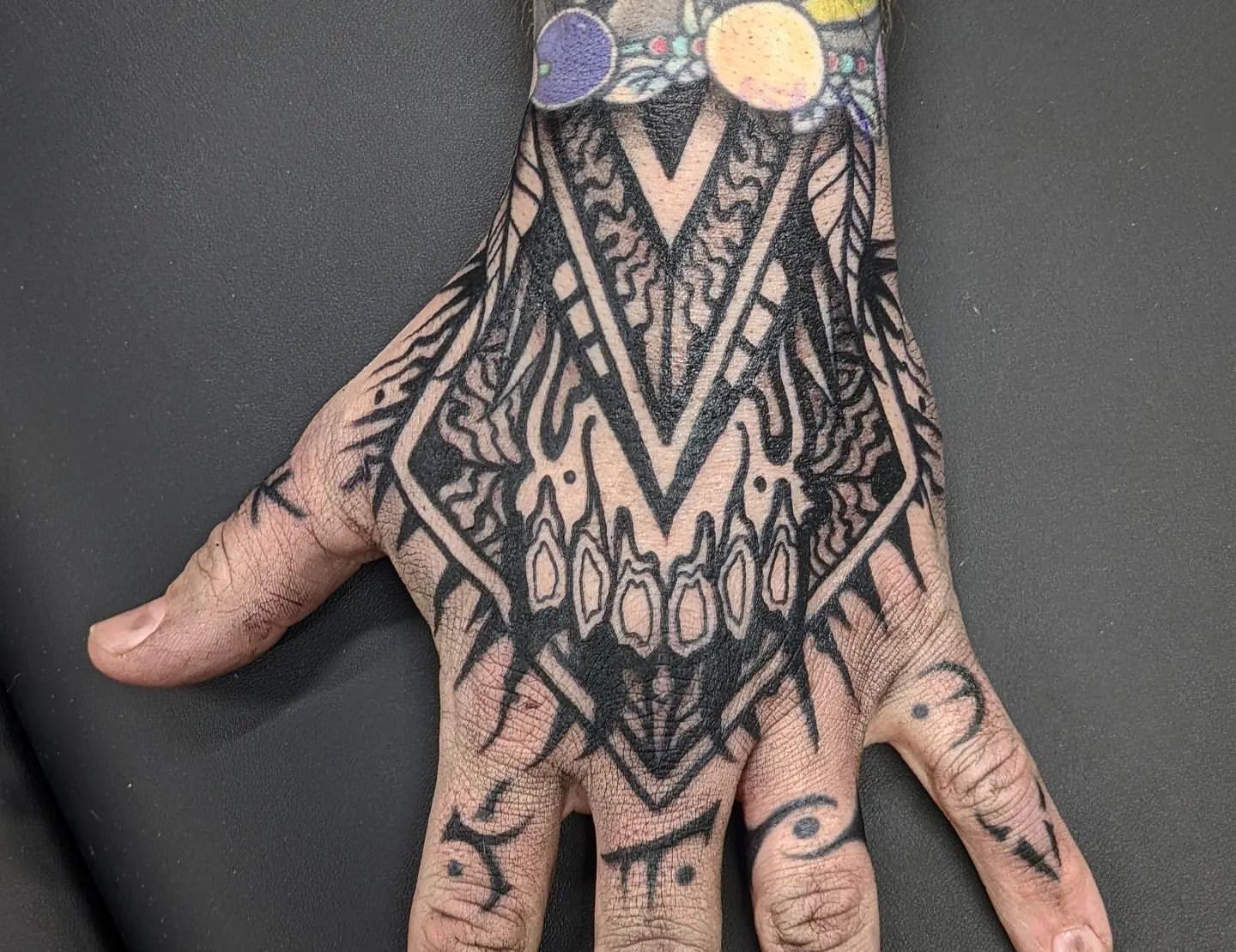 Geometric Hand Tattoo by Amber Strange at Black Gold Tattoo Co in Edmonton Alberta Canada