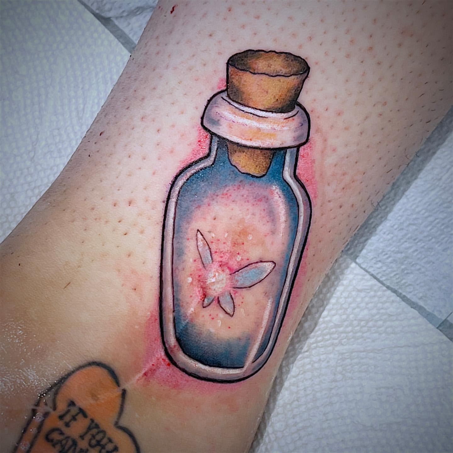 Fairy Bottle Tattoo by Tony Honning at Crimson Empire Tattoo in Edmonton Alberta Canada