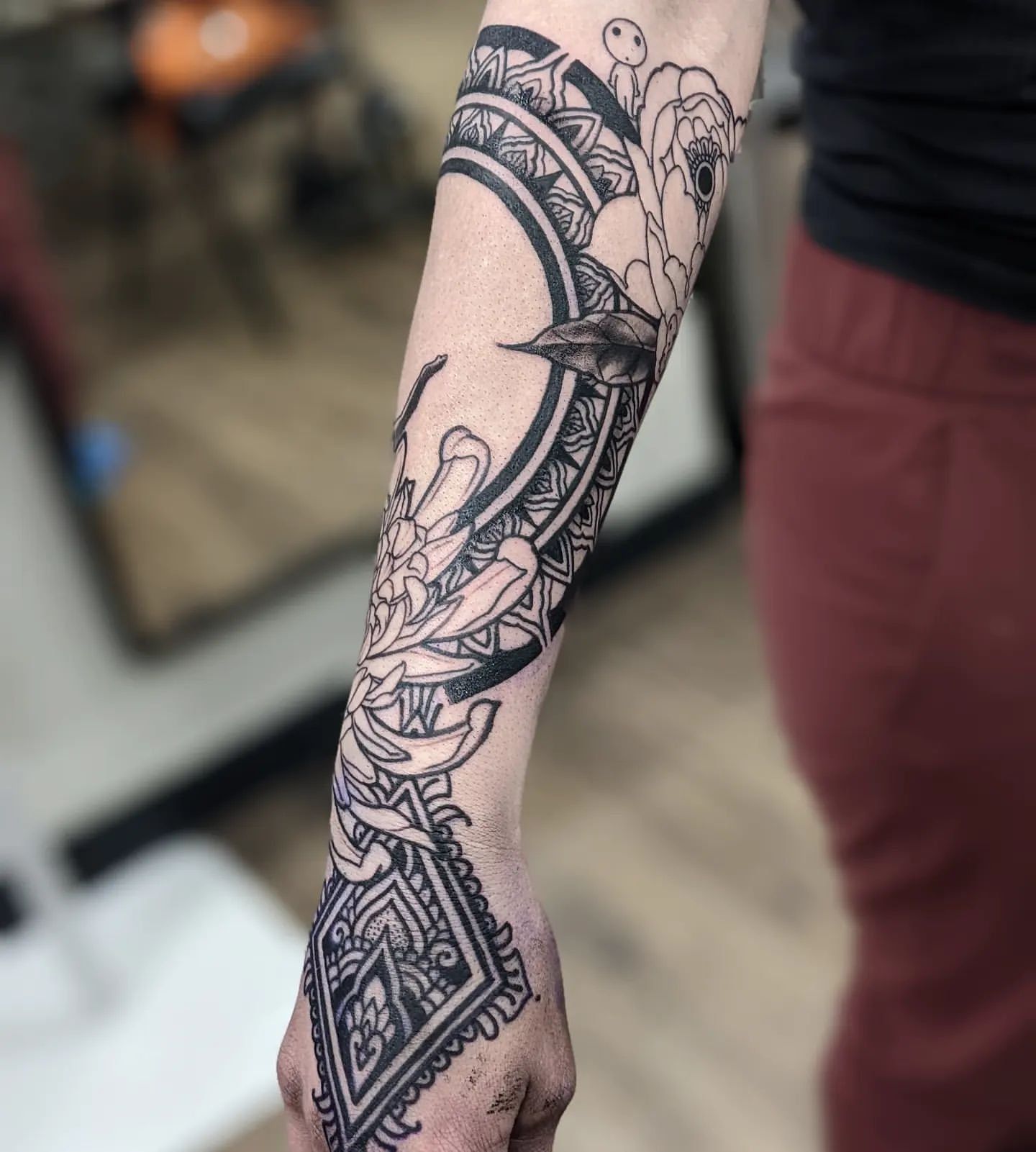 Geometric and Floral Tattoo by Amber Strange at Black Gold Tattoo Co in Edmonton Alberta Canada