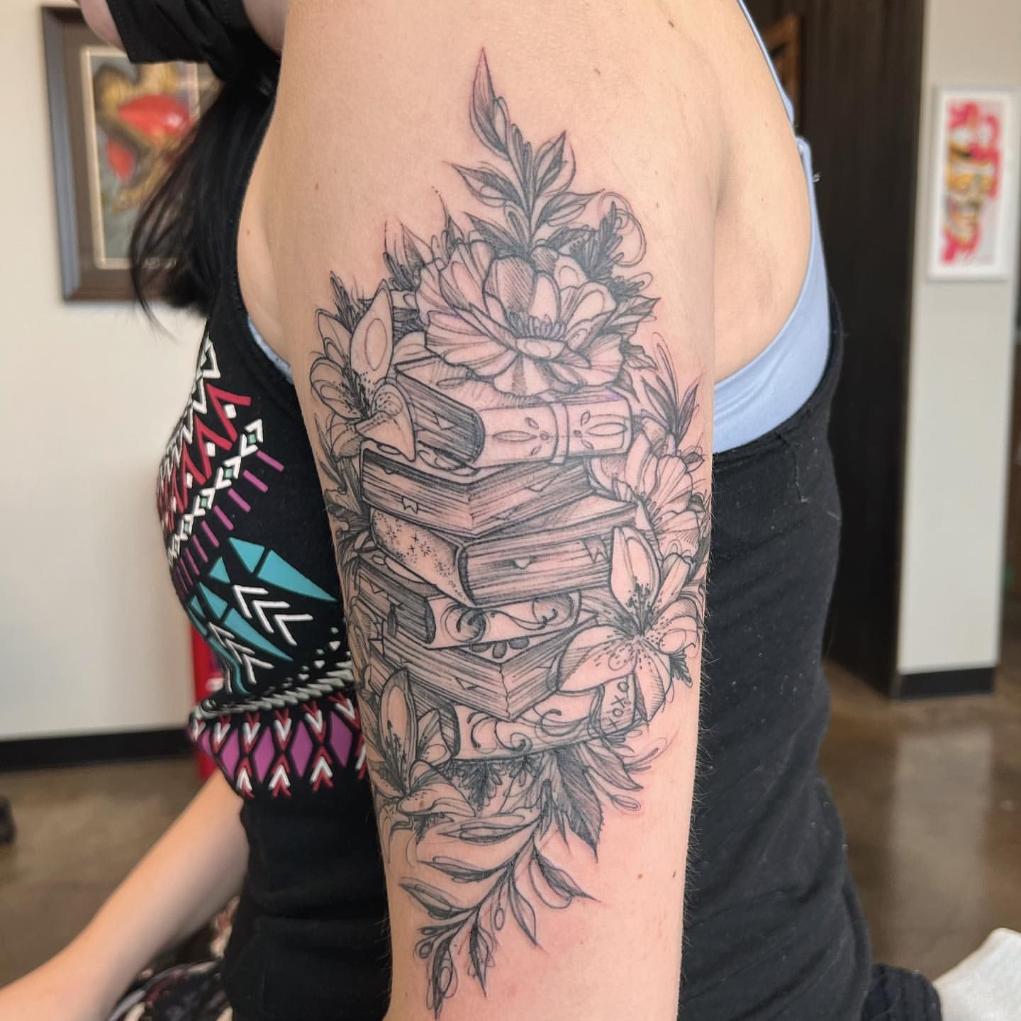 Floral and Books Tattoo by Adrienne Alexander at Silver Ghost Tattoo in Edmonton Alberta Canada