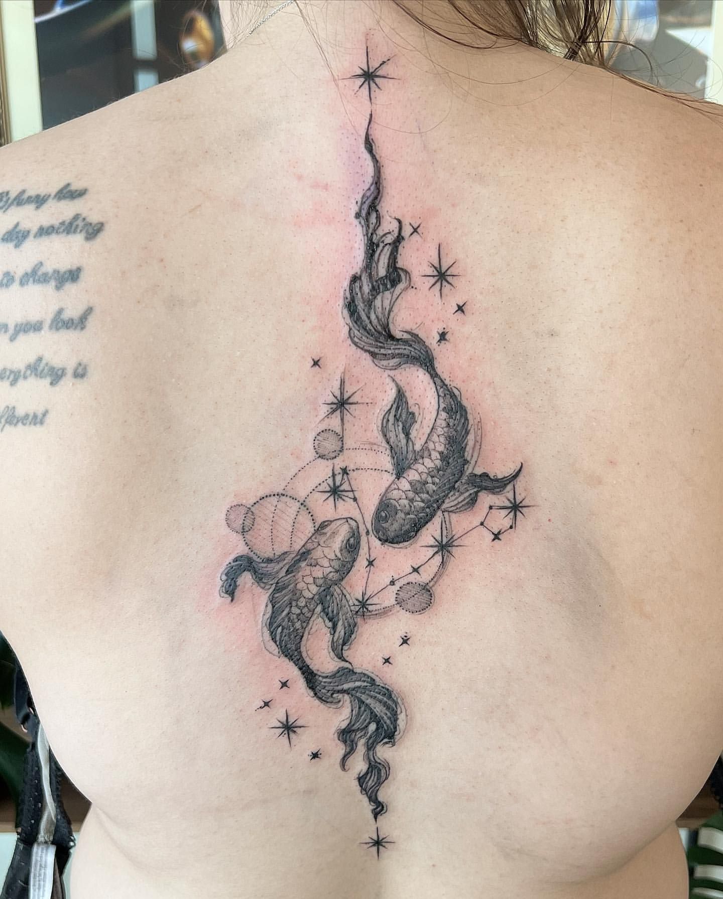 Koi Fish Tattoo by Adrienne Alexander at Silver Ghost Tattoo in Edmonton Alberta Canada