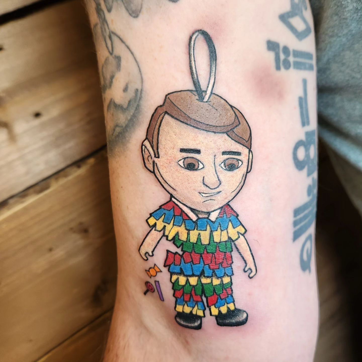 Pinata Man Tattoo by Sheila Anderson at Crimson Empire Tattoo in Edmonton Alberta Canada