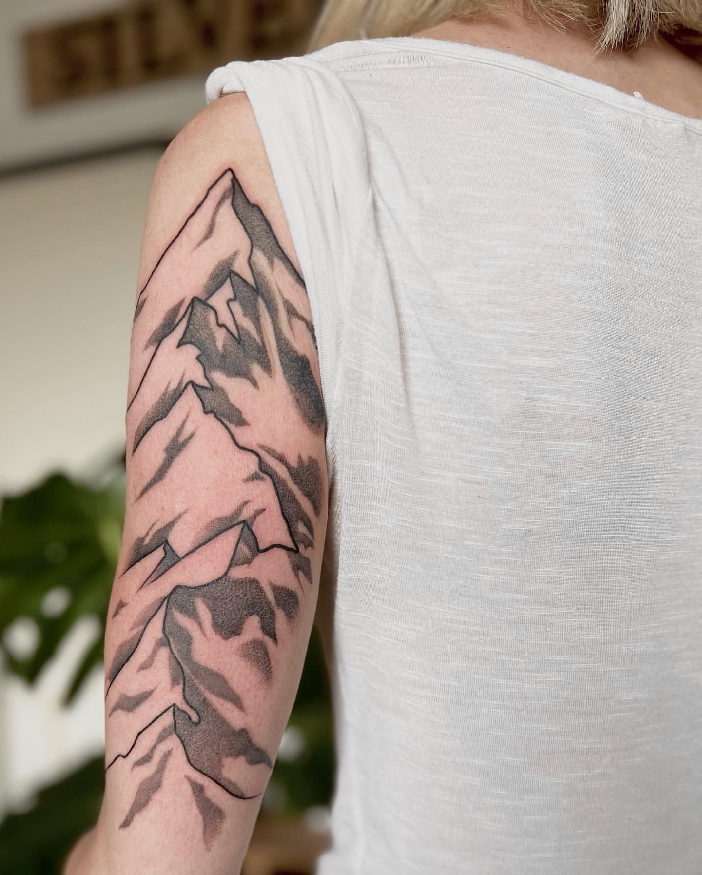 Mountains Tattoo by Liza Kruk at Silver Ghost Tattoo in Edmonton Alberta Canada