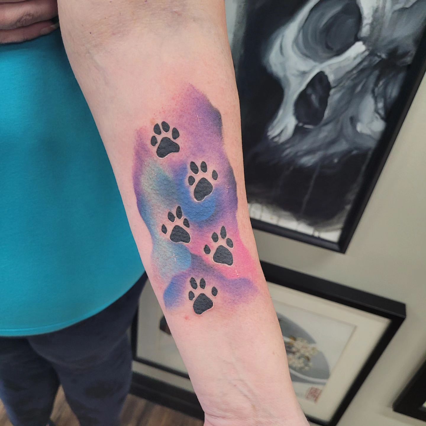 Watercolour Paw Print Tattoo by Ian Wang at Black Gold Tattoo Co in Edmonton Alberta Canada
