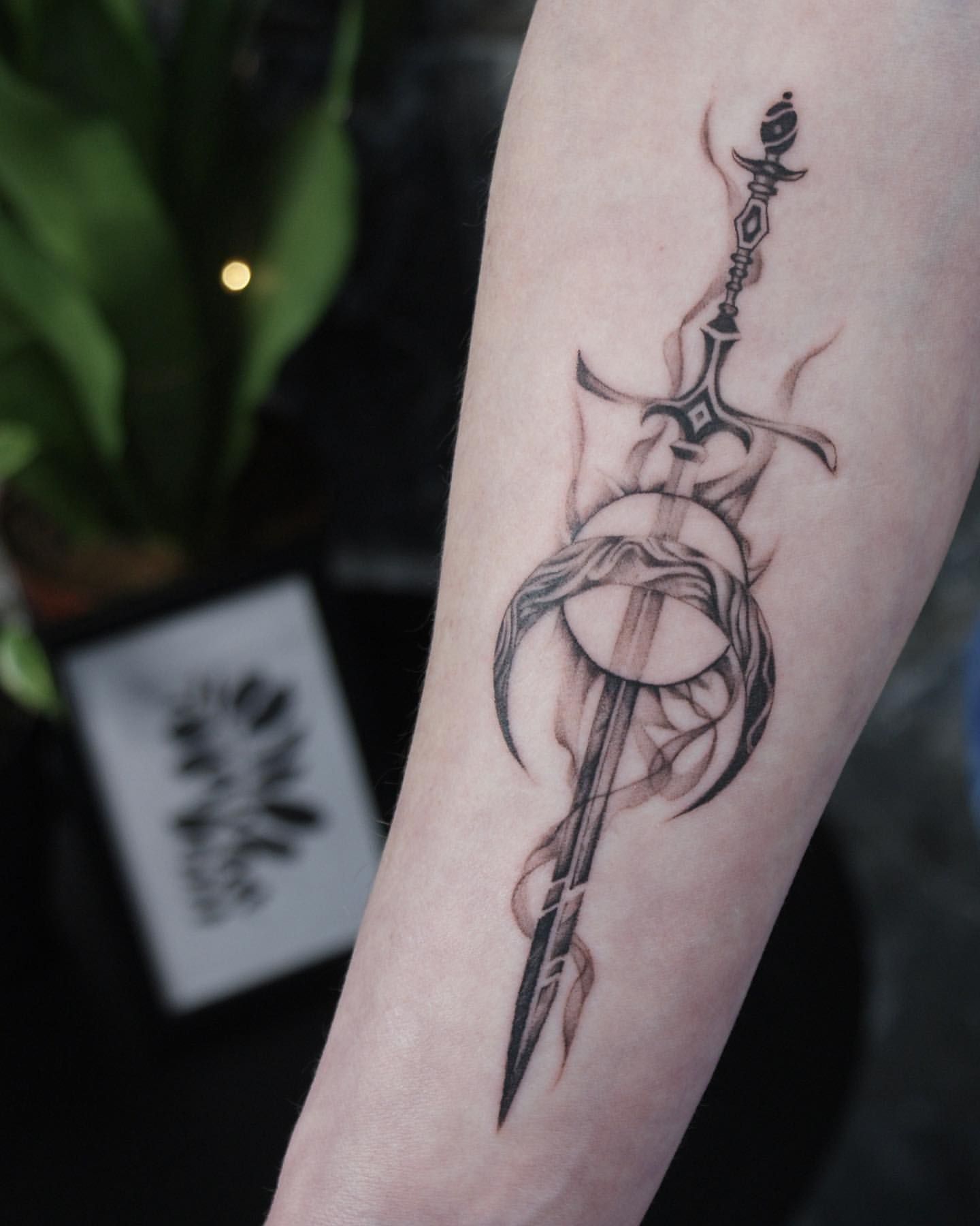 Sword and Moon Tattoo by Liza Kruk at Silver Ghost Tattoo in Edmonton Alberta Canada
