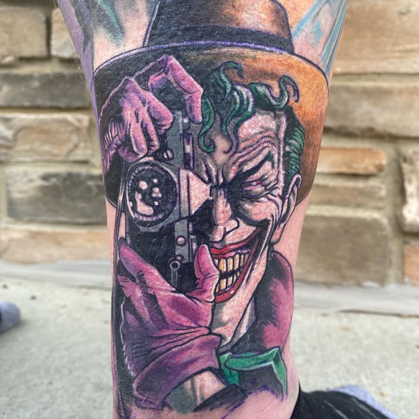Killing Joke Joker Tattoo by Chris Labrenz at Black Gold Tattoo Co in Edmonton Alberta Canada
