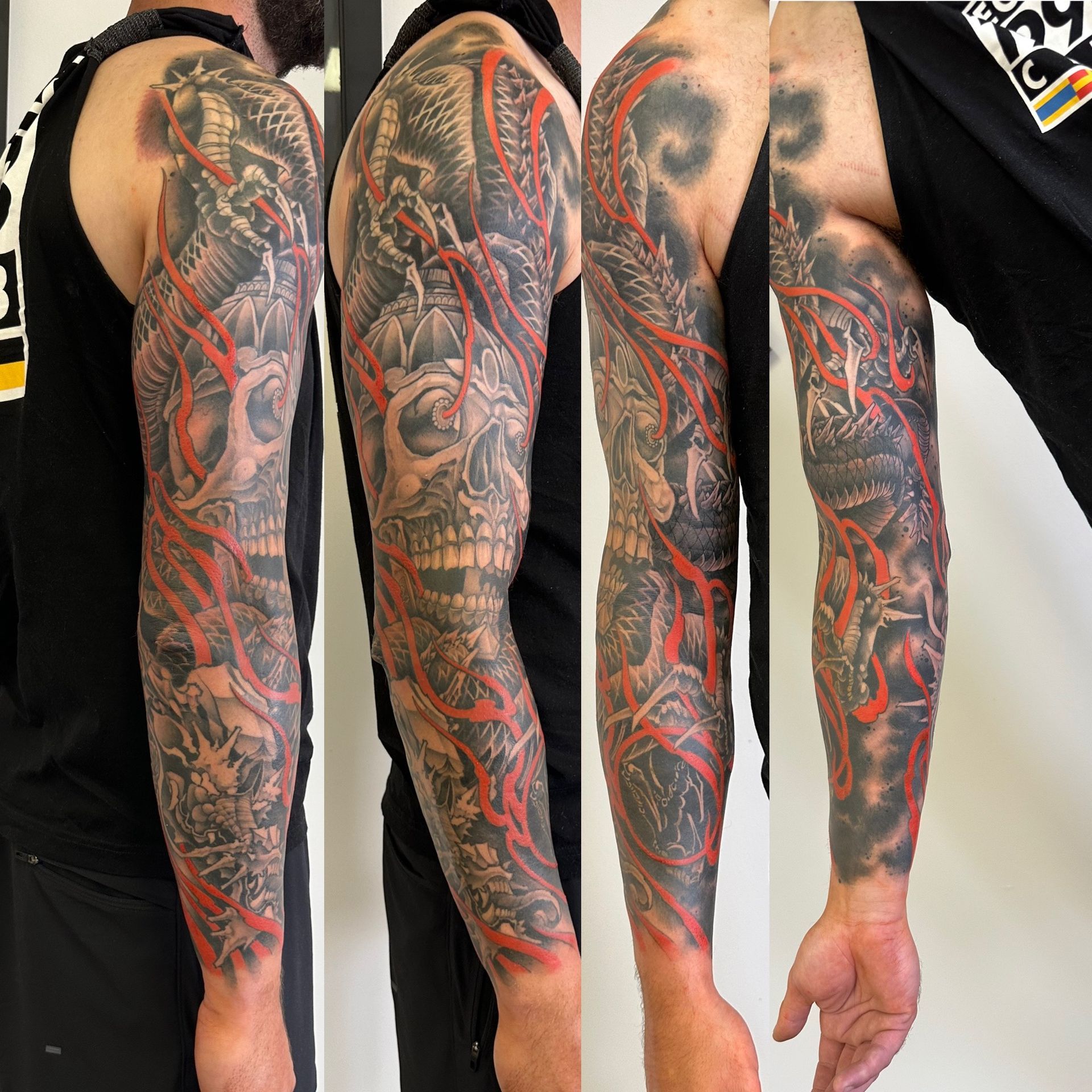 Skull and Dragon Sleeve by Brain Dangerfield at Black Gold Tattoo Co in Edmonton Alberta Canada