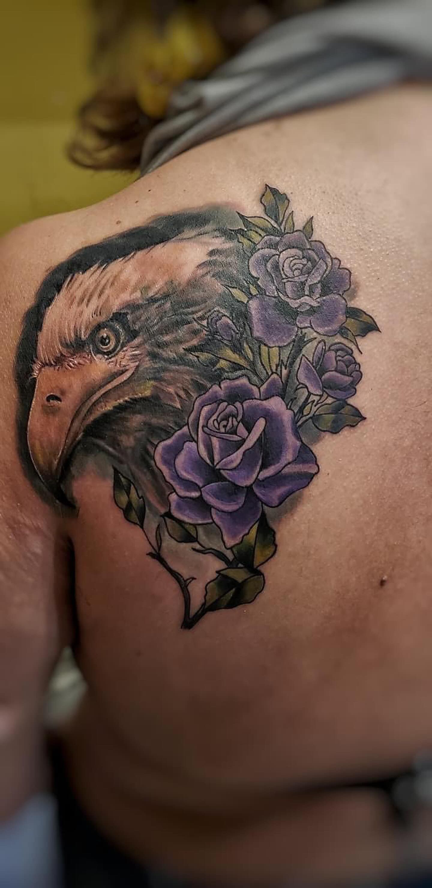 Eagle and Roses Tattoo by Sly at Silver Ghost Tattoo in Edmonton Alberta Canada