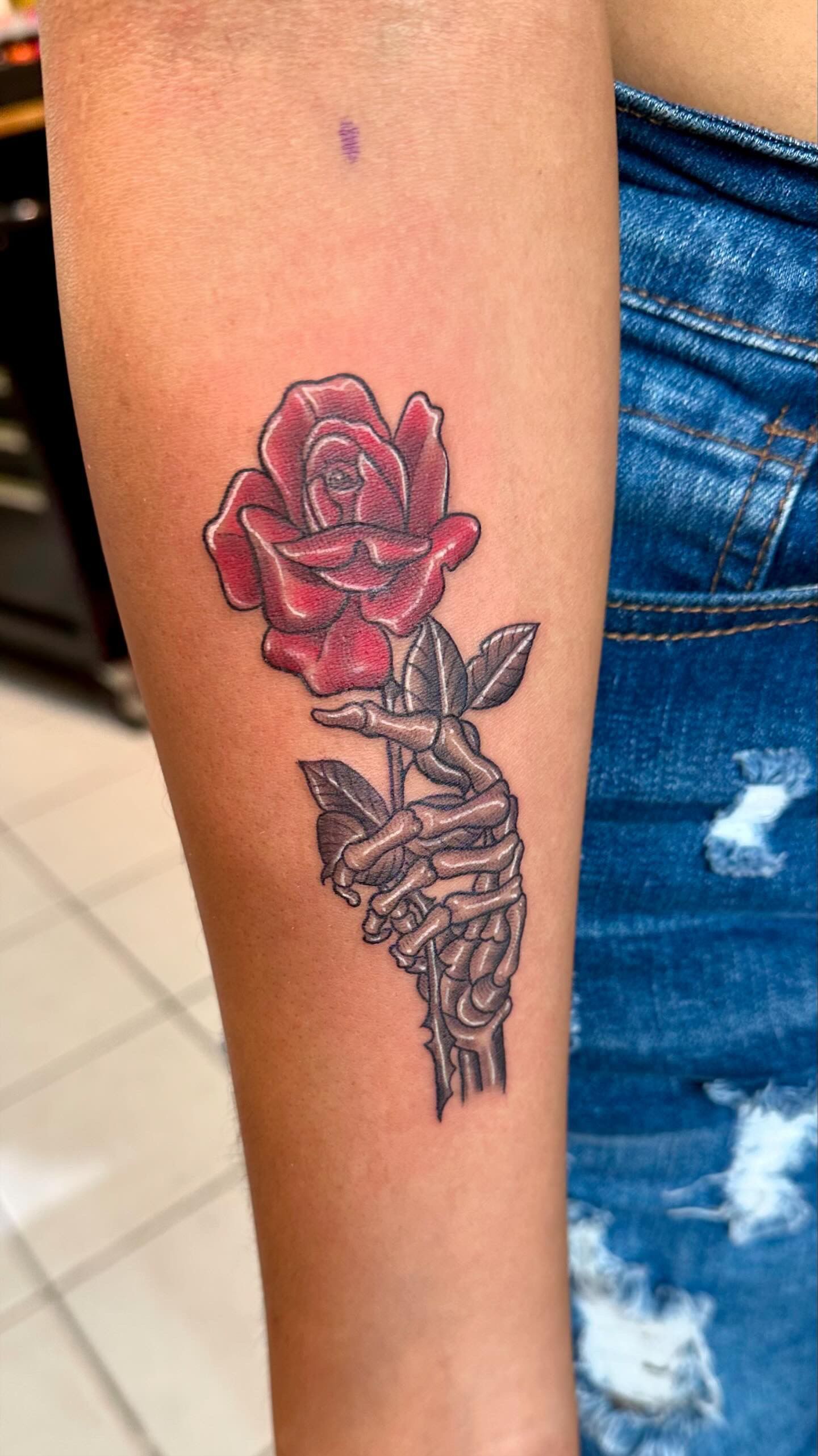 Skeleton Hand and Rose Tattoo by Sly at Silver Ghost Tattoo in Edmonton Alberta Canada