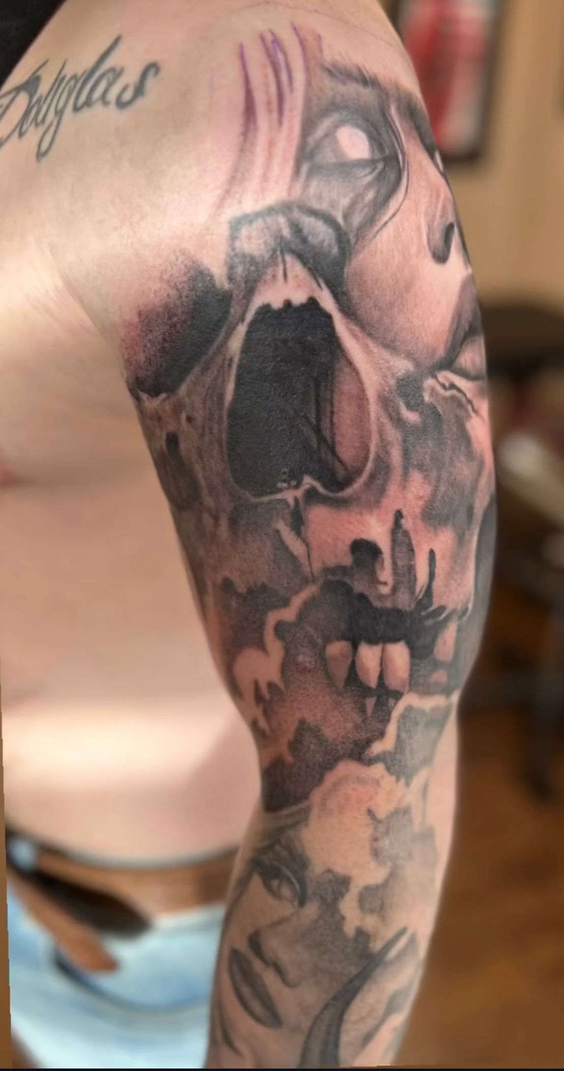 Skull and Portraits Sleeve by Alan Coates at Silver Ghost Tattoo in Edmonton Alberta Canada
