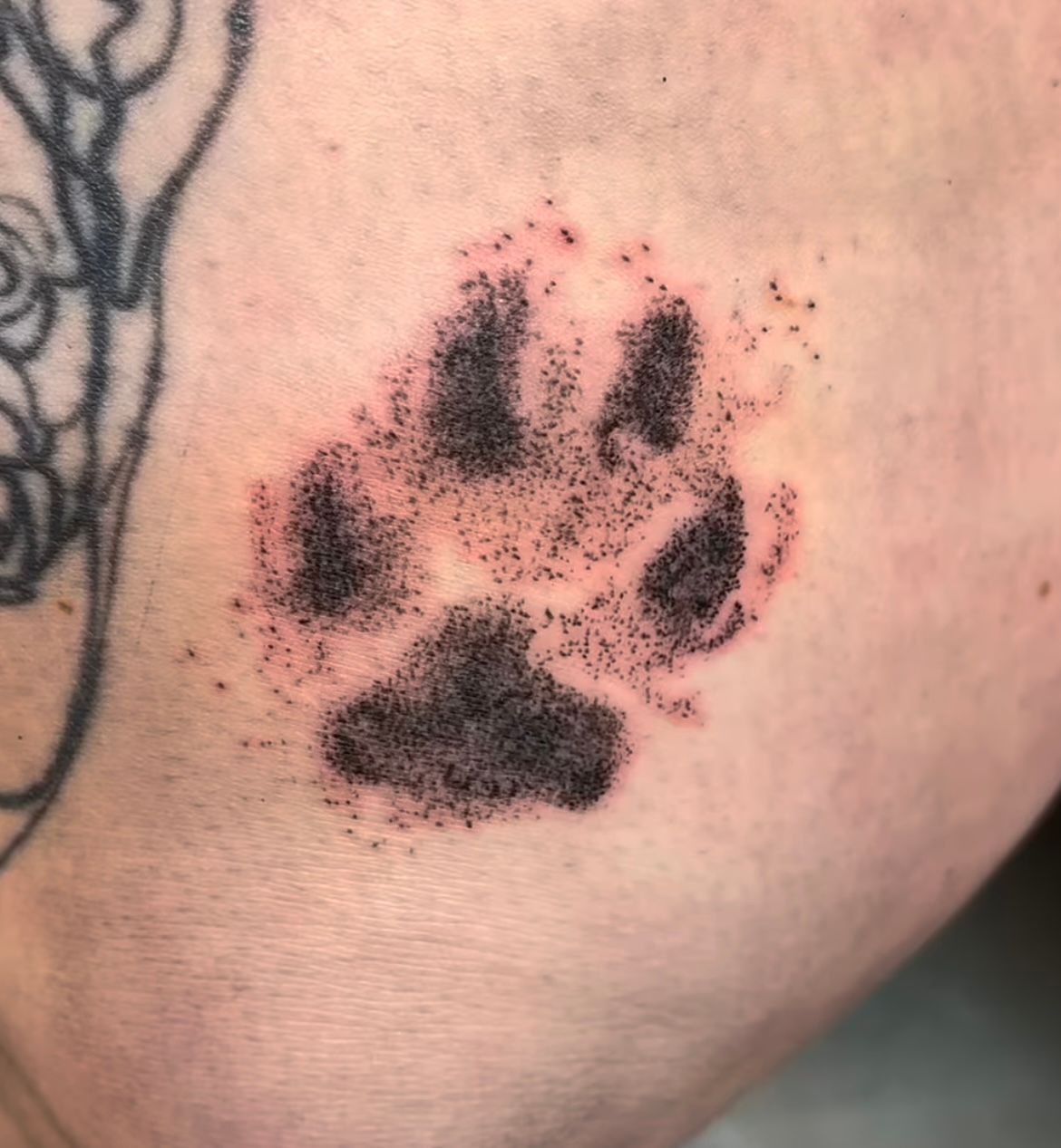 Paw Print Tattoo by Keon Courtney at Crimson Empire Tattoo in Edmonton Alberta Canada