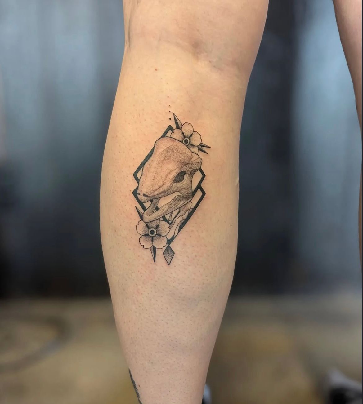 Dinosaur Skull Tattoo by Samantha Hnatiw at Crimson Empire Tattoo in Edmonton Alberta Canada