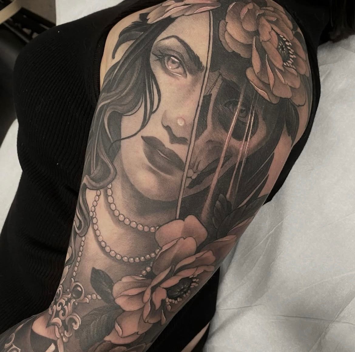 Split Portrait Tattoo by Sasha Day at Crimson Empire Tattoo in Edmonton Alberta Canada