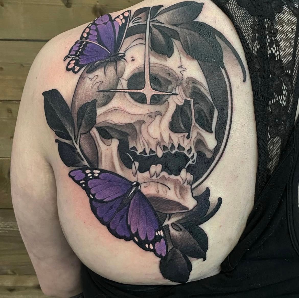 Skull and Butterfly Tattoo by Sasha Day at Crimson Empire Tattoo in Edmonton Alberta Canada