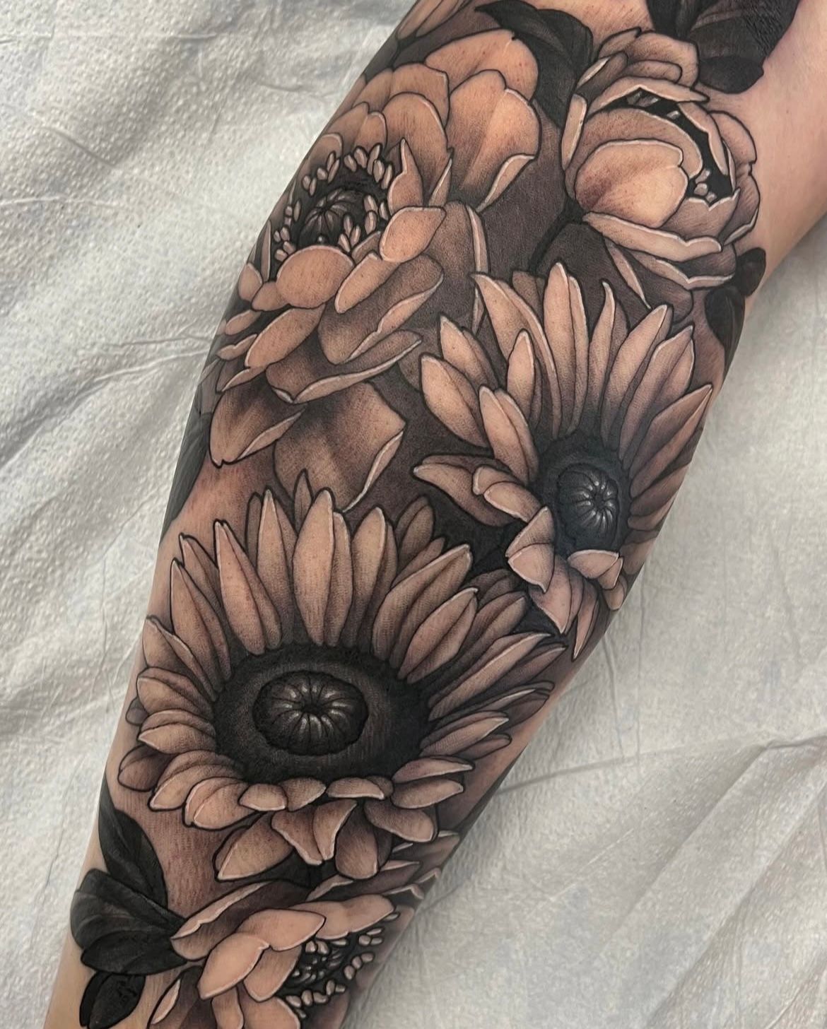 Sunflowers and Peonies Tattoo by Sasha Day at Crimson Empire Tattoo in Edmonton Alberta Canada