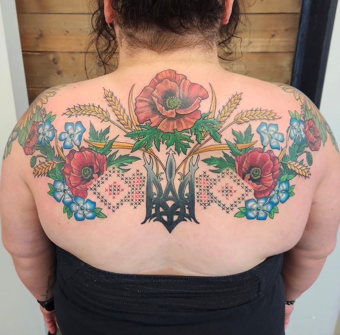 Ukrainian Cross Stitch Tattoo by Sheila Anderson at Crimson Empire Tattoo in Edmonton Alberta Canada
