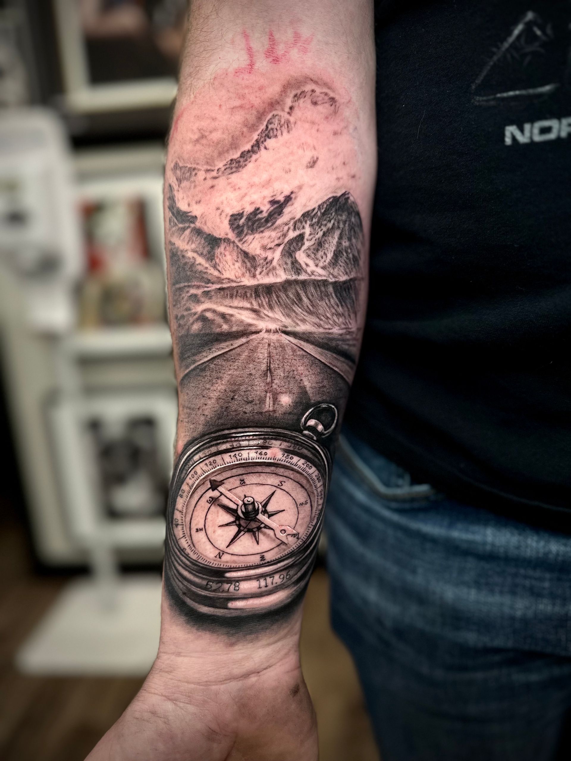 Compass and Mountains Tattoo by Jackson Sukhov at Black Gold Tattoo Co in Edmonton Alberta Canada