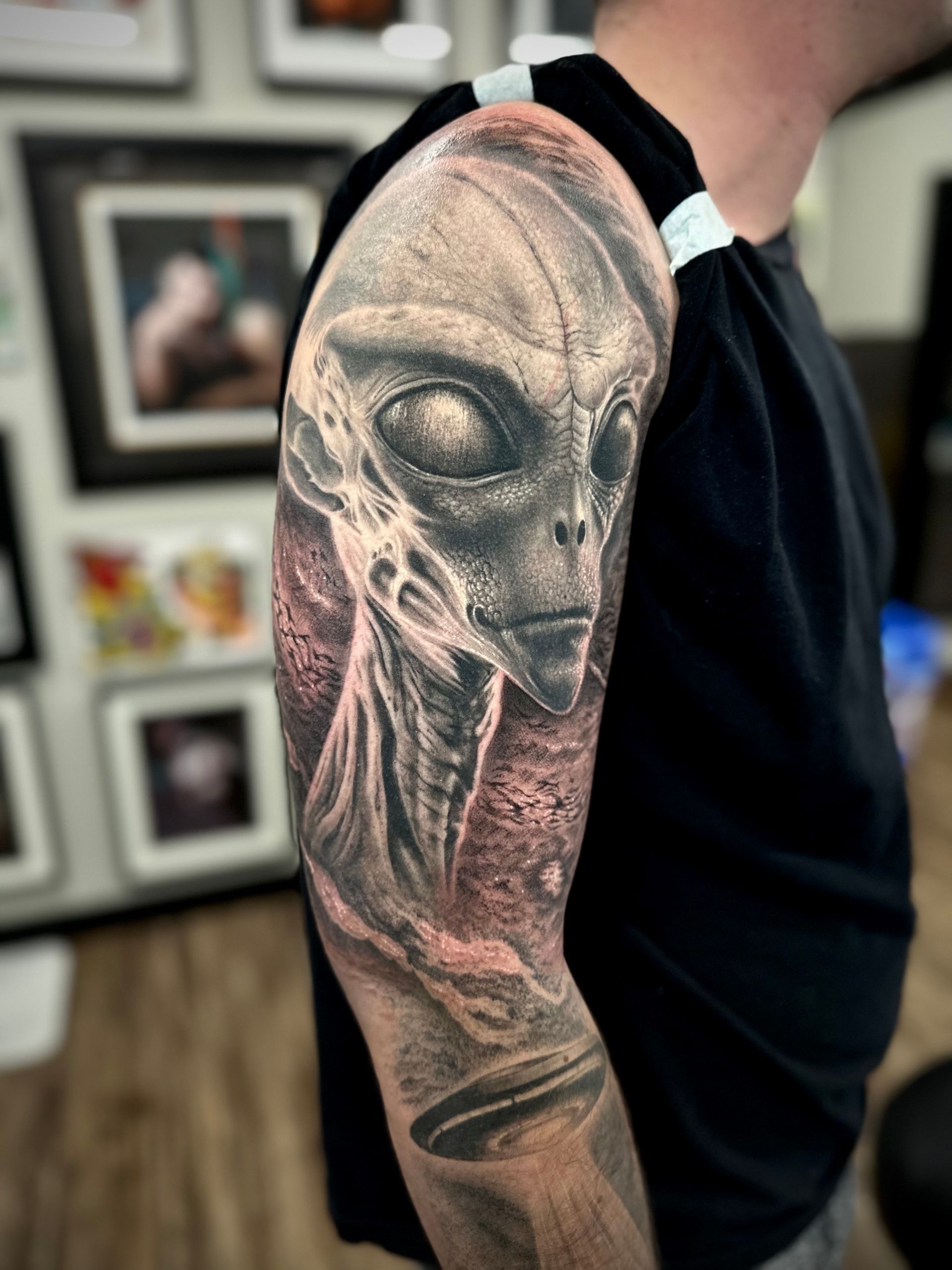 Alien Tattoo by Jackson Sukhov at Black Gold Tattoo Co in Edmonton Alberta Canada
