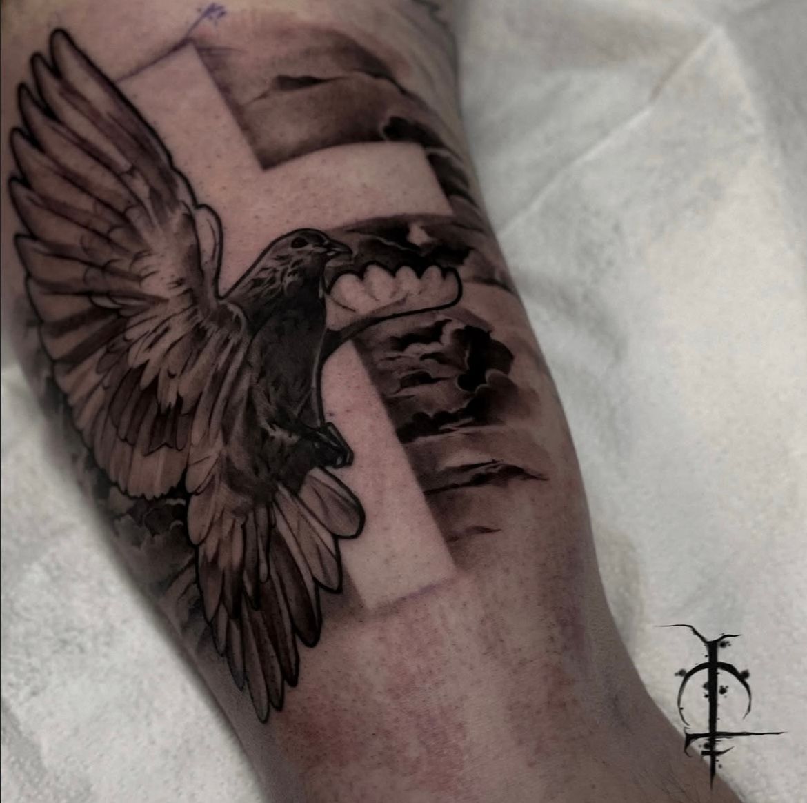 Dove and Cross Tattoo by Val at Silver Ghost Tattoo in Edmonton Alberta Canada