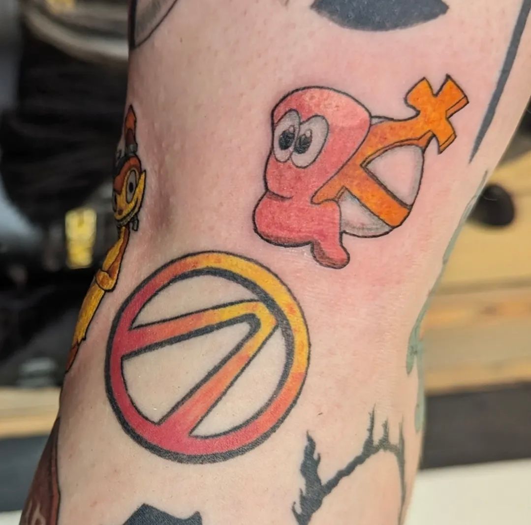 Worms and Borderlands Tattoo by Samantha Hnatiw at Crimson Empire Tattoo in Edmonton Alberta Canada