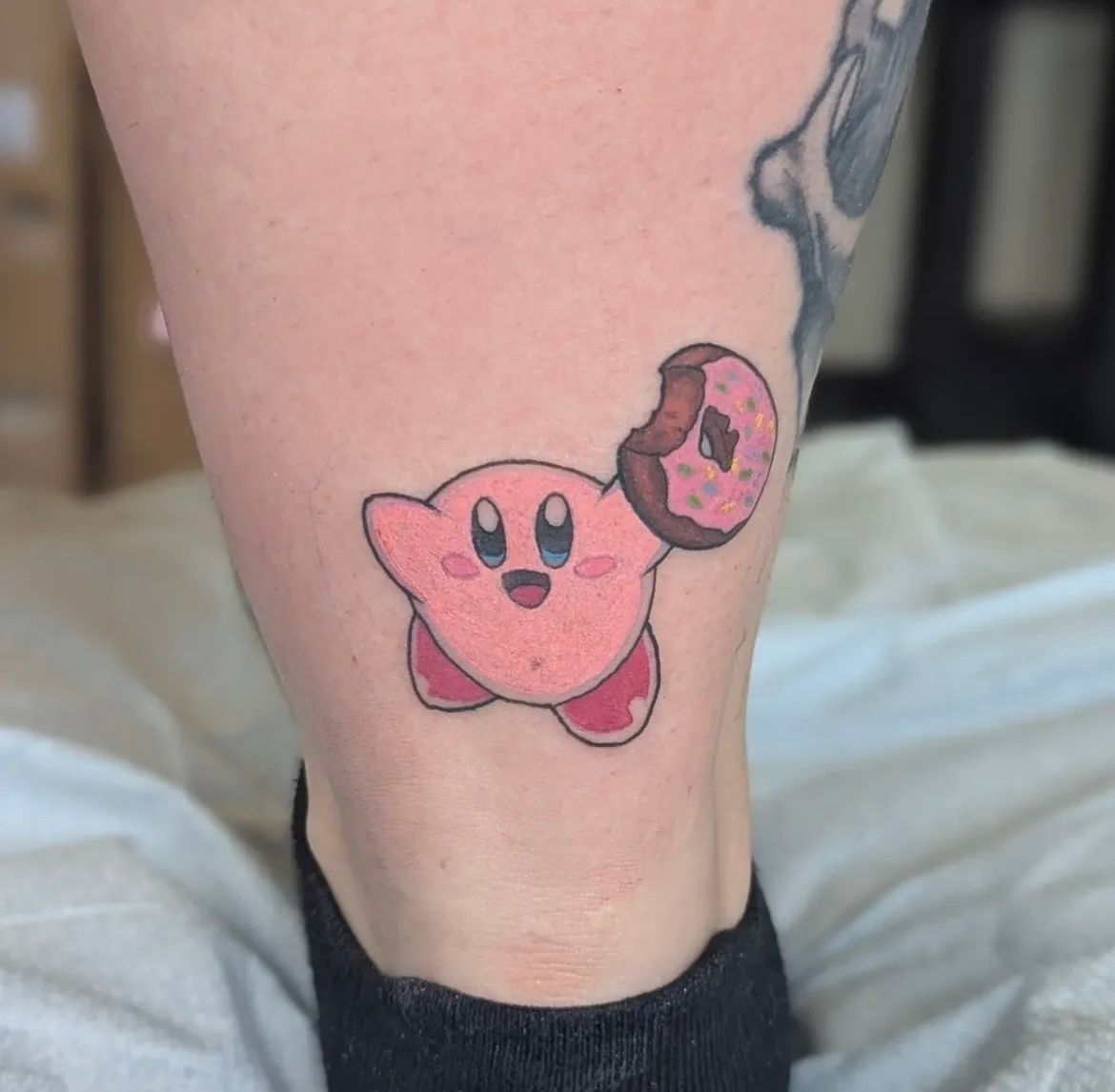 Kirby Tattoo by Samantha Hnatiw at Crimson Empire Tattoo in Edmonton Alberta Canada