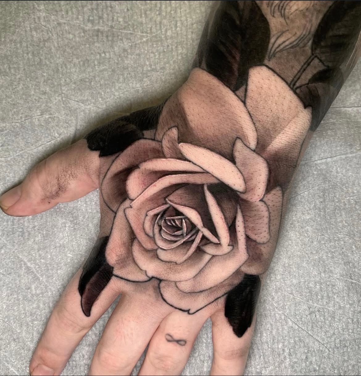 Rose Tattoo by Sasha Day at Crimson Empire Tattoo in Edmonton Alberta Canada