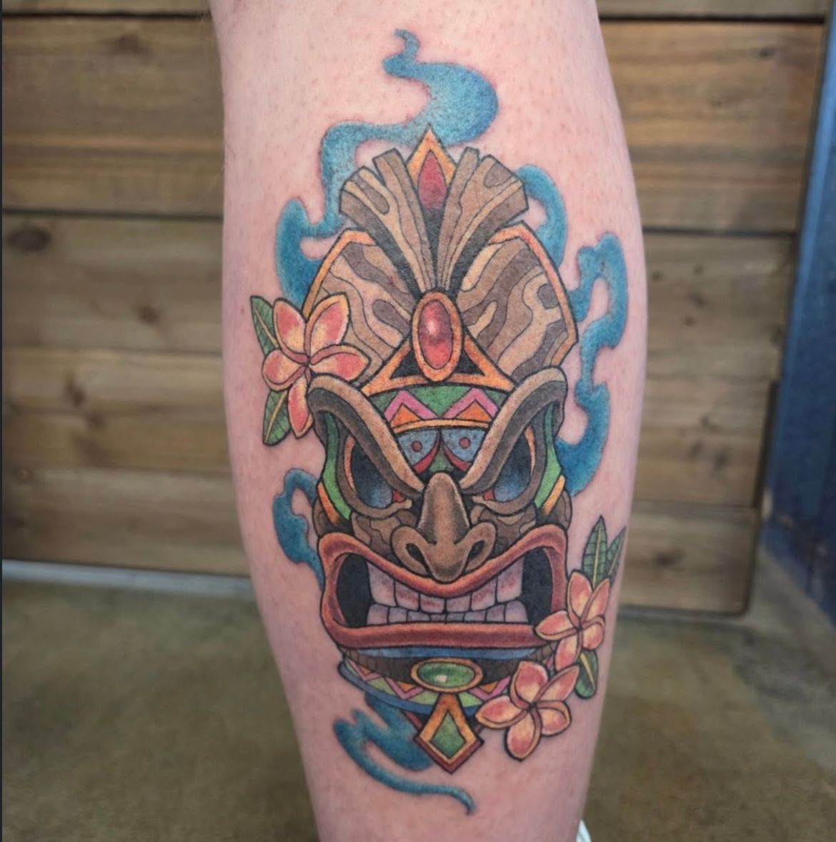Tiki Mask Tattoo by Sheila Anderson at Crimson Empire Tattoo in Edmonton Alberta Canada