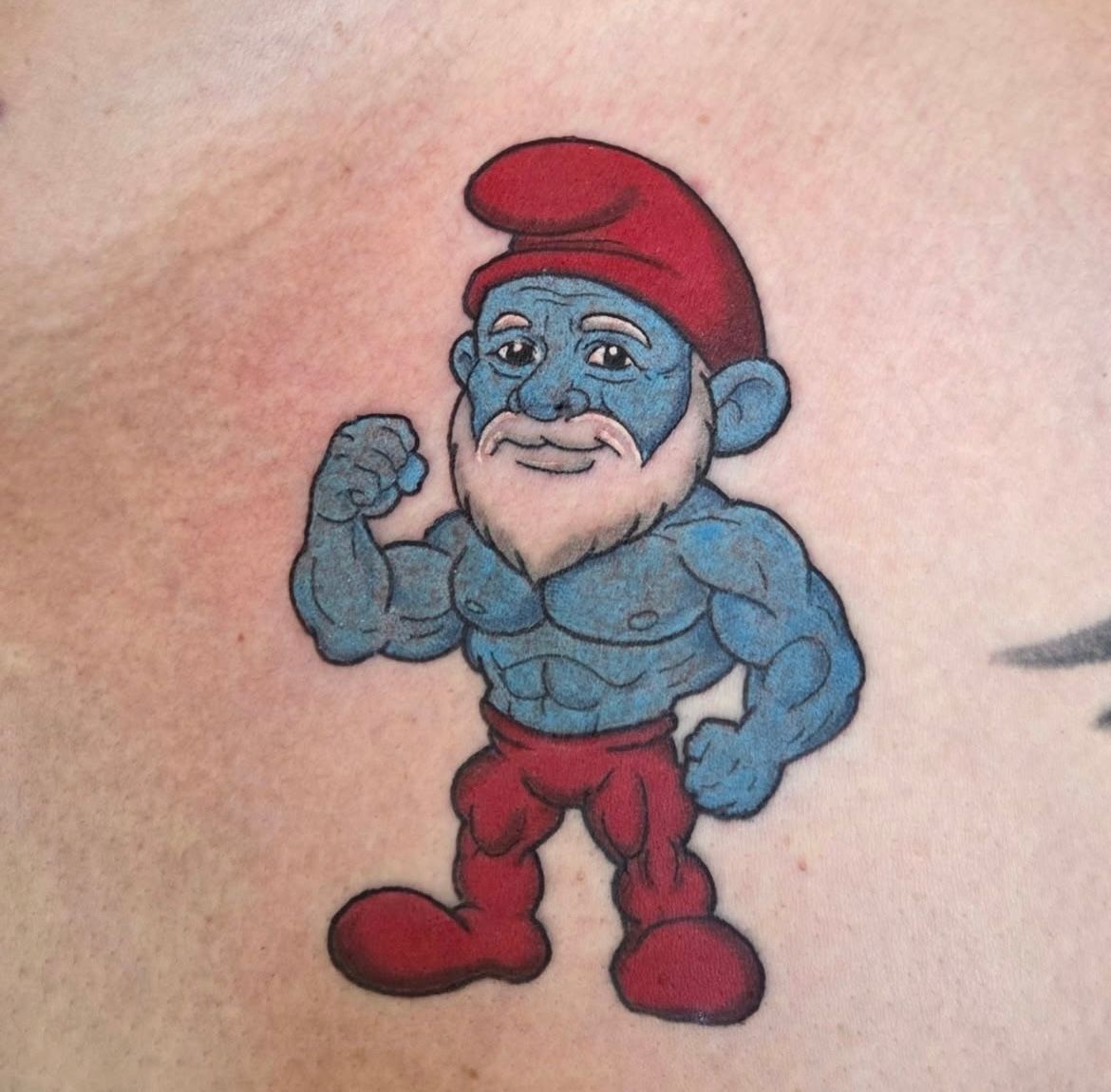 Papa Smurf Tattoo by Sheila Anderson at Crimson Empire Tattoo in Edmonton Alberta Canada