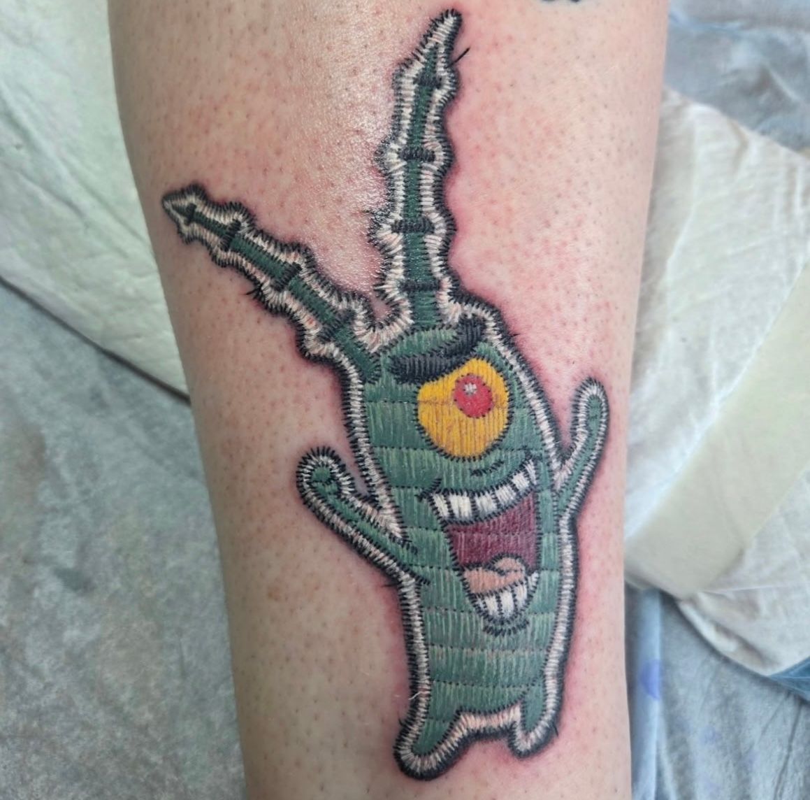 Patch Style Plankton Tattoo by Sheila Anderson at Crimson Empire Tattoo in Edmonton Alberta Canada