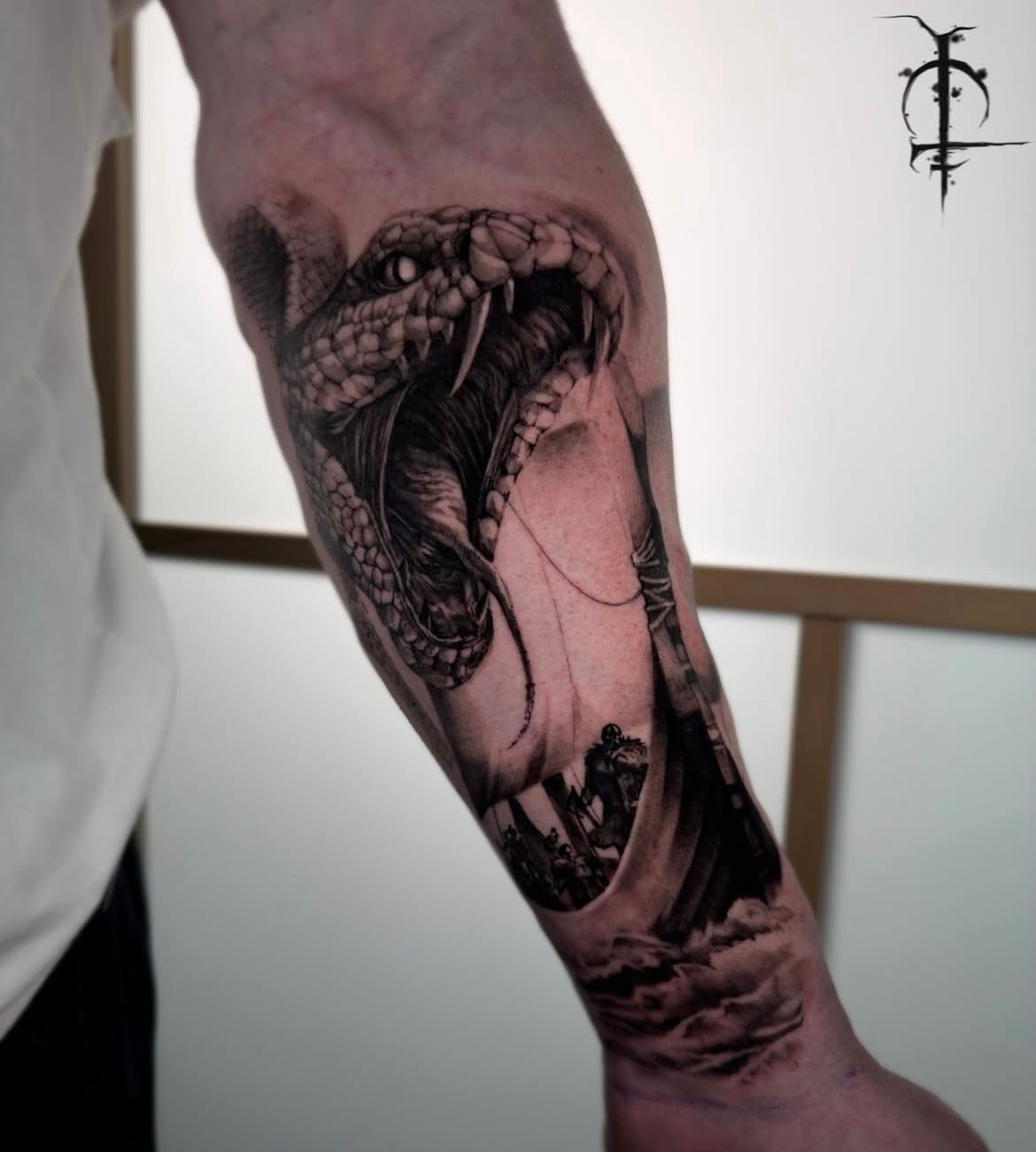 Viking Longship and World Serpent Tattoo by Val at Silver Ghost Tattoo in Edmonton Alberta Canada