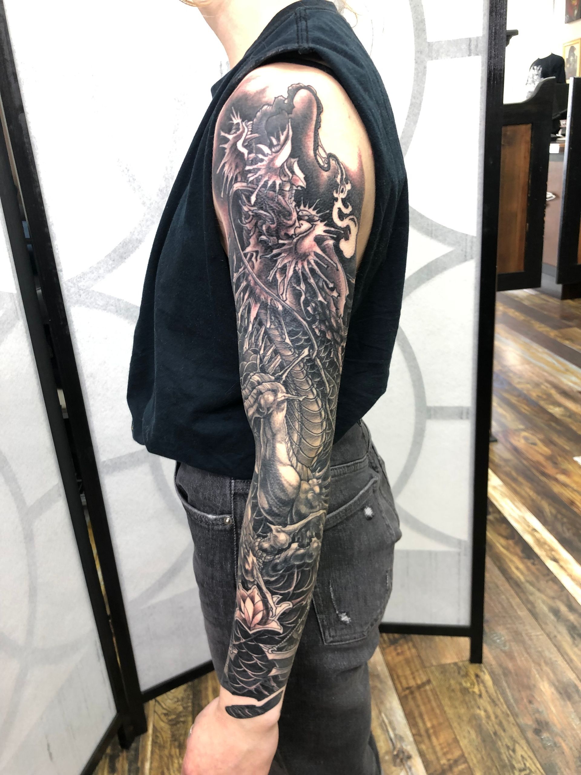 Dragon Sleeve by Brain Dangerfield at Black Gold Tattoo Co in Edmonton Alberta Canada