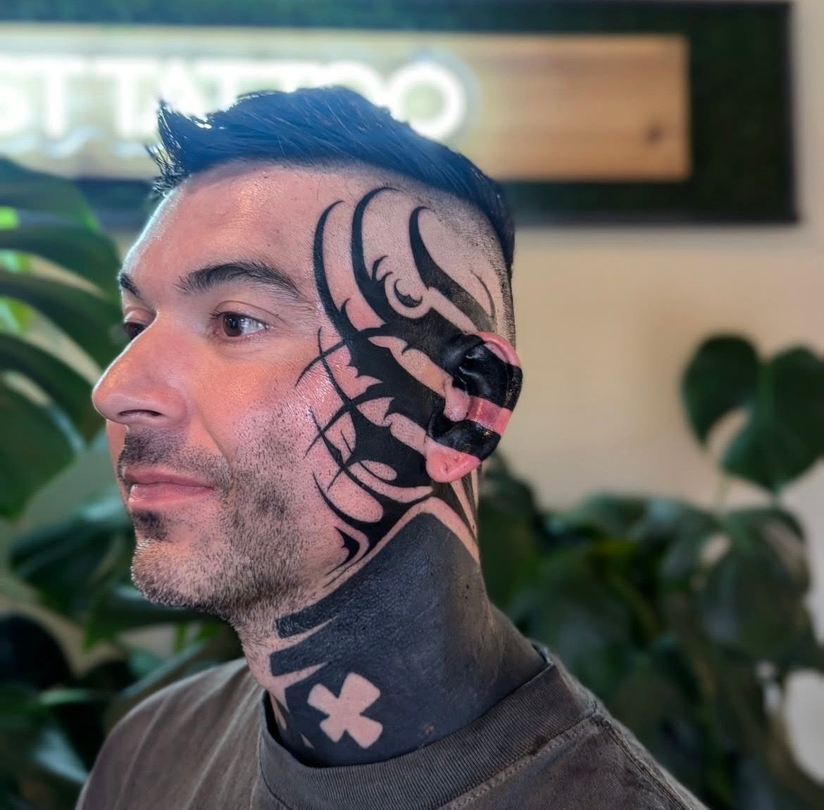 Blackwork Face Tattoo by Amber Strange at Silver Ghost Tattoo in Edmonton Alberta Canada