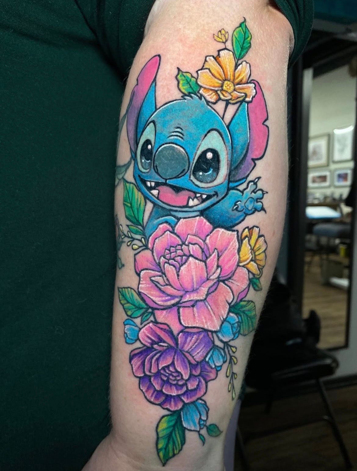 Stitch and Floral Tattoo by Chris Labrenz at Black Gold Tattoo Co in Edmonton Alberta Canada
