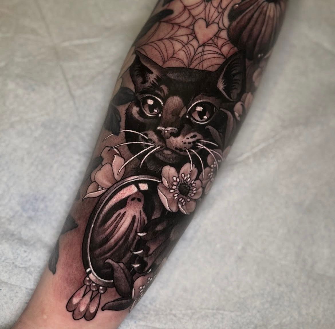 Cat Tattoo by Sasha Day at Crimson Empire Tattoo in Edmonton Alberta Canada