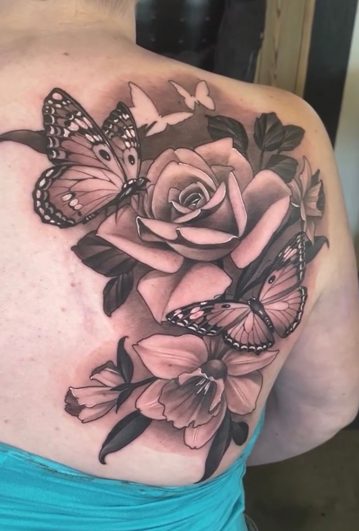 Butterflies and Floral Tattoo by Sasha Day at Crimson Empire Tattoo in Edmonton Alberta Canada