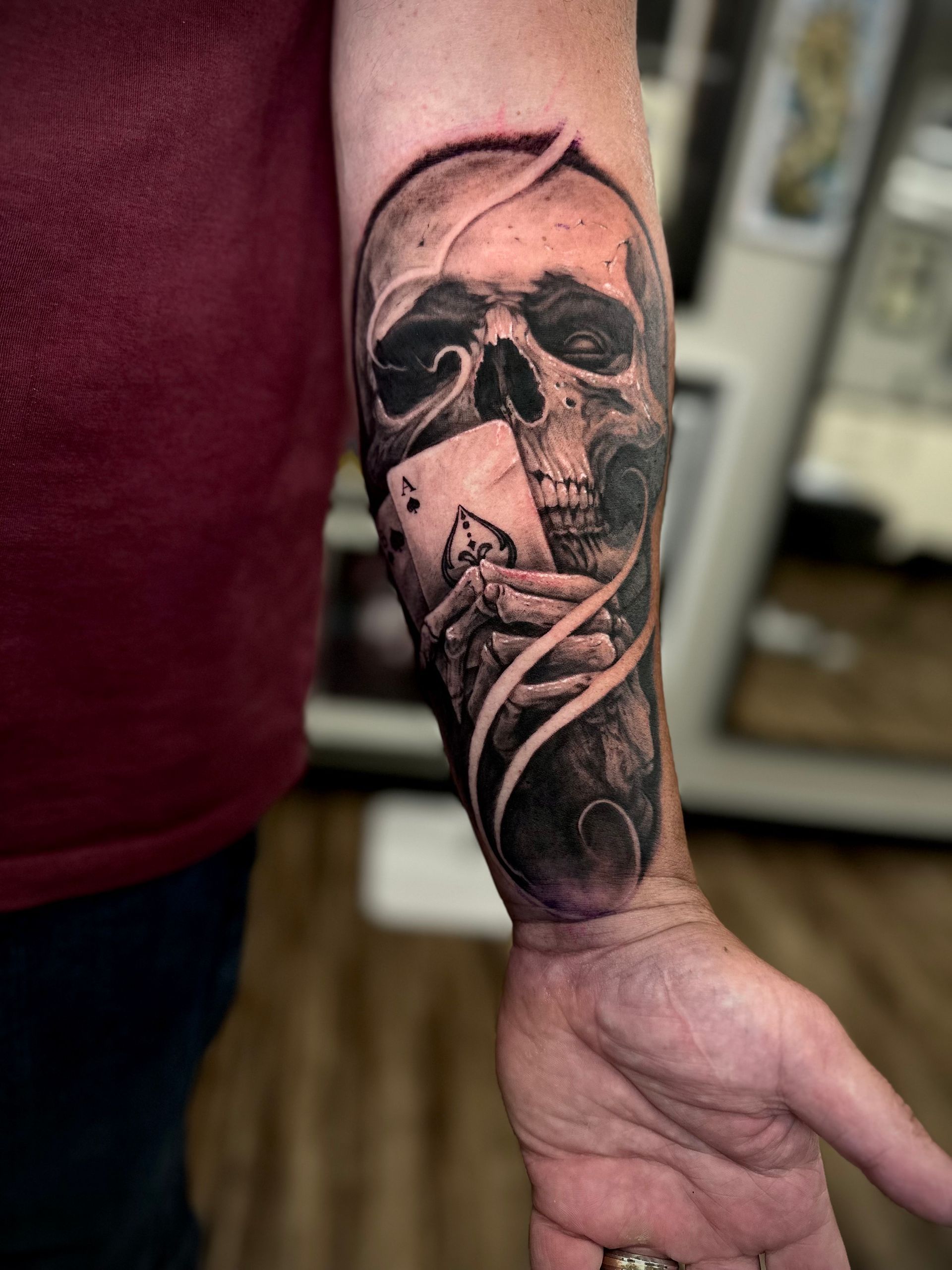 Skull and Cards Tattoo by Jackson Sukhov at Black Gold Tattoo Co in Edmonton Alberta Canada