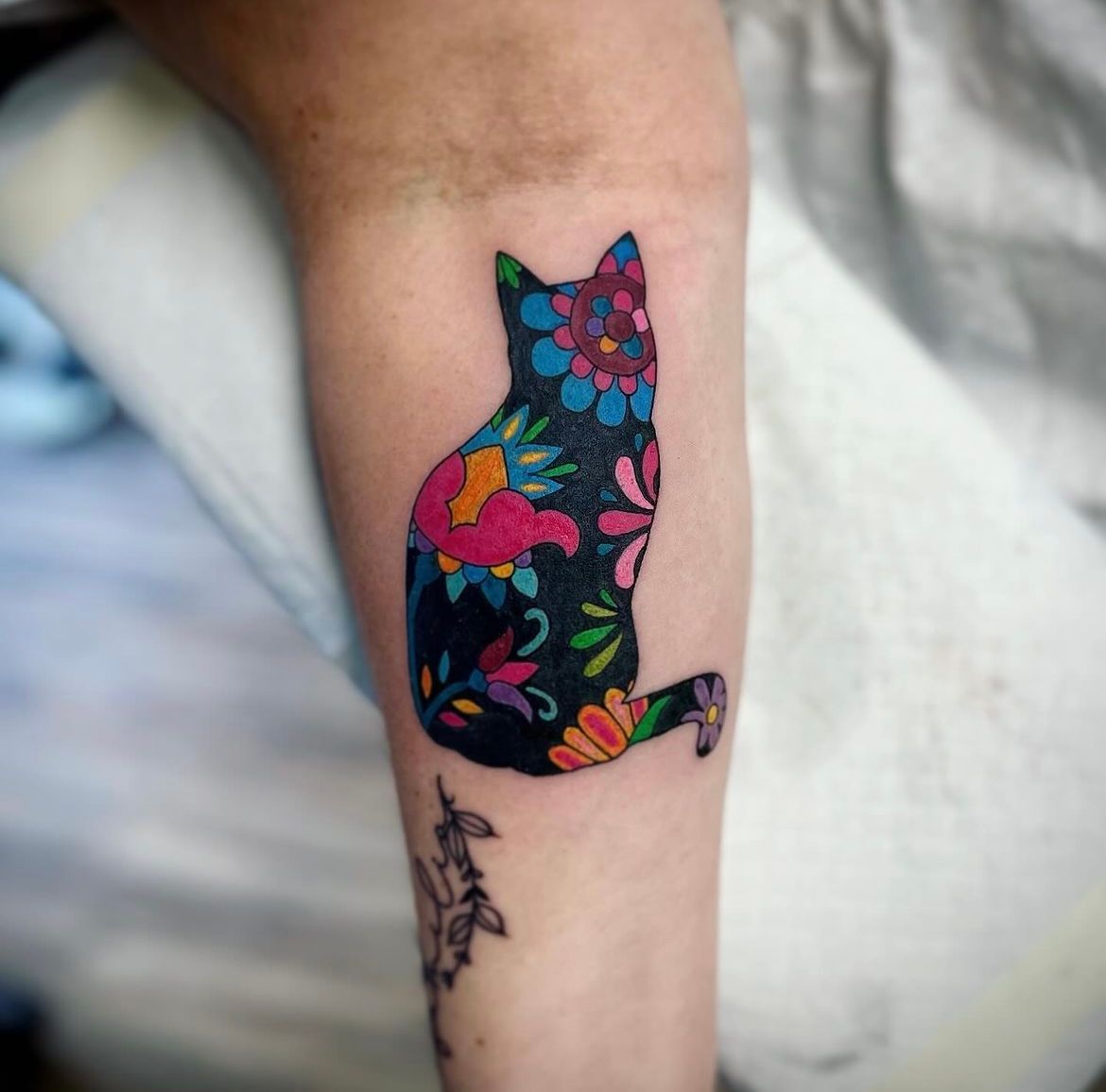 Cat and Floral Tattoo by Jess Alther at Black Gold Tattoo Co in Edmonton Alberta Canada