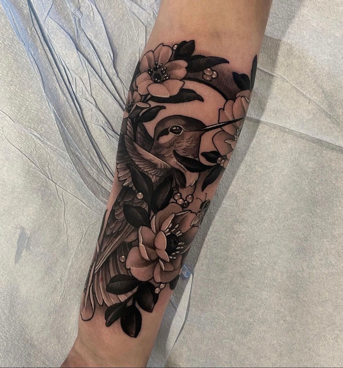 Hummingbird and Floral Tattoo by Sasha Day at Crimson Empire Tattoo in Edmonton Alberta Canada