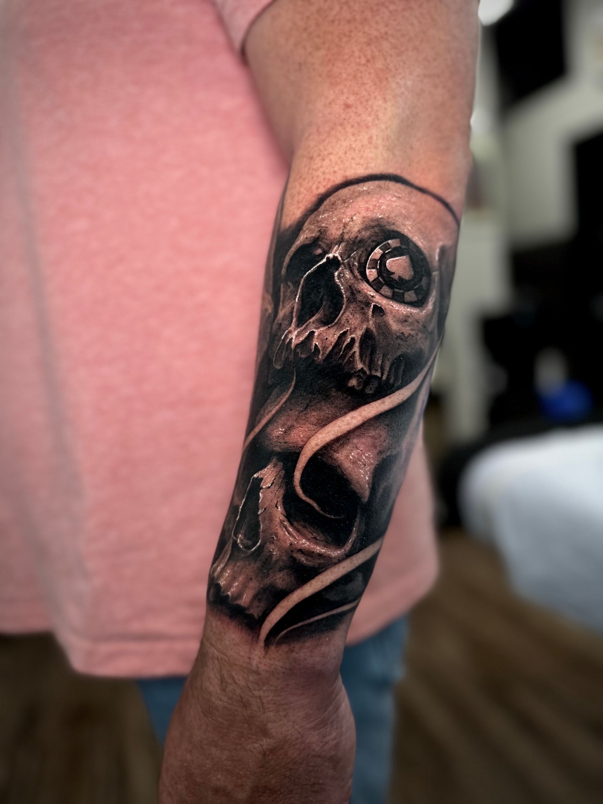 Skulls and Poker Chip Tattoo by Jackson Sukhov at Black Gold Tattoo Co in Edmonton Alberta Canada