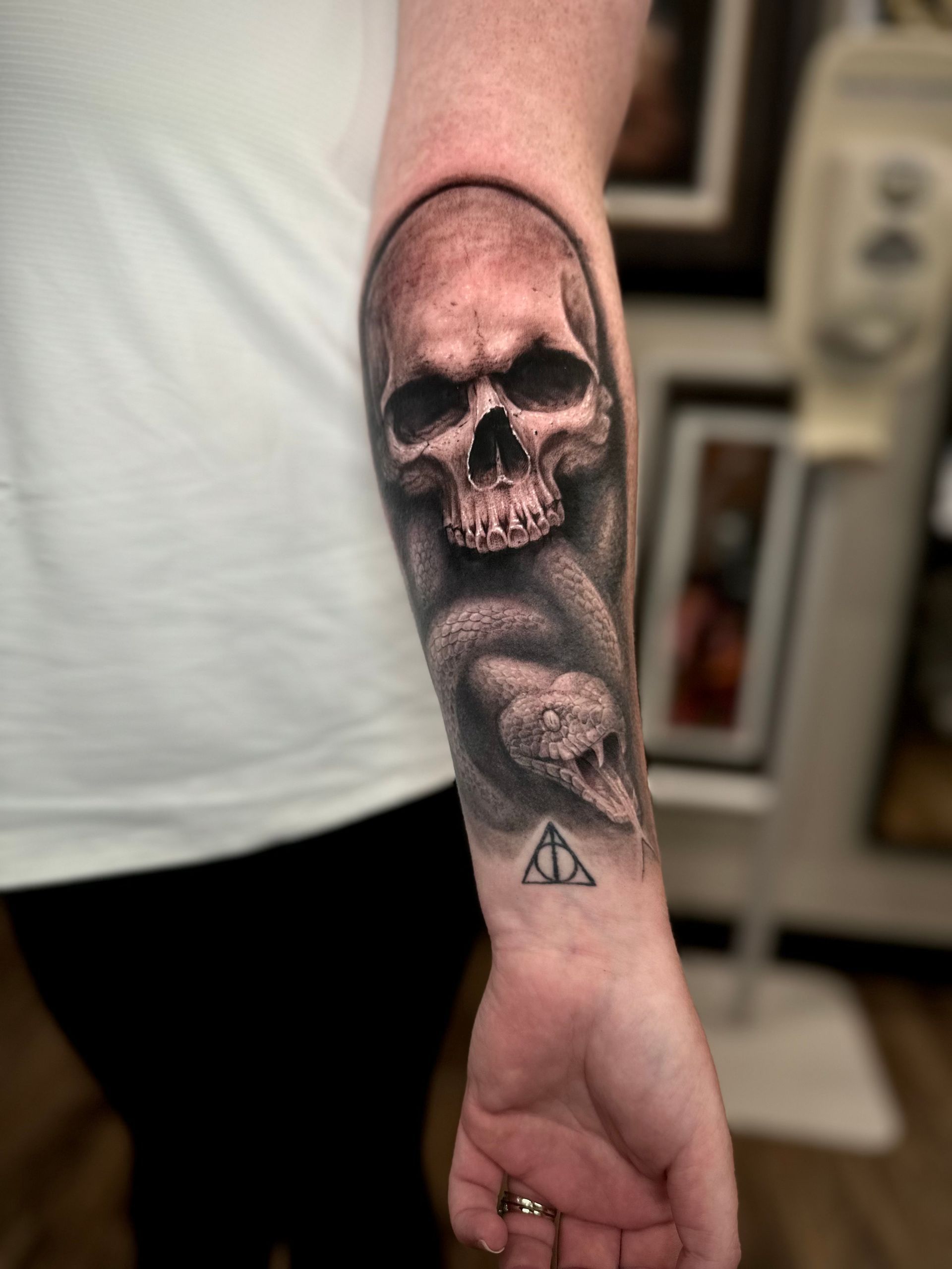 Deathly Hallows Tattoo by Jackson Sukhov at Black Gold Tattoo Co in Edmonton Alberta Canada