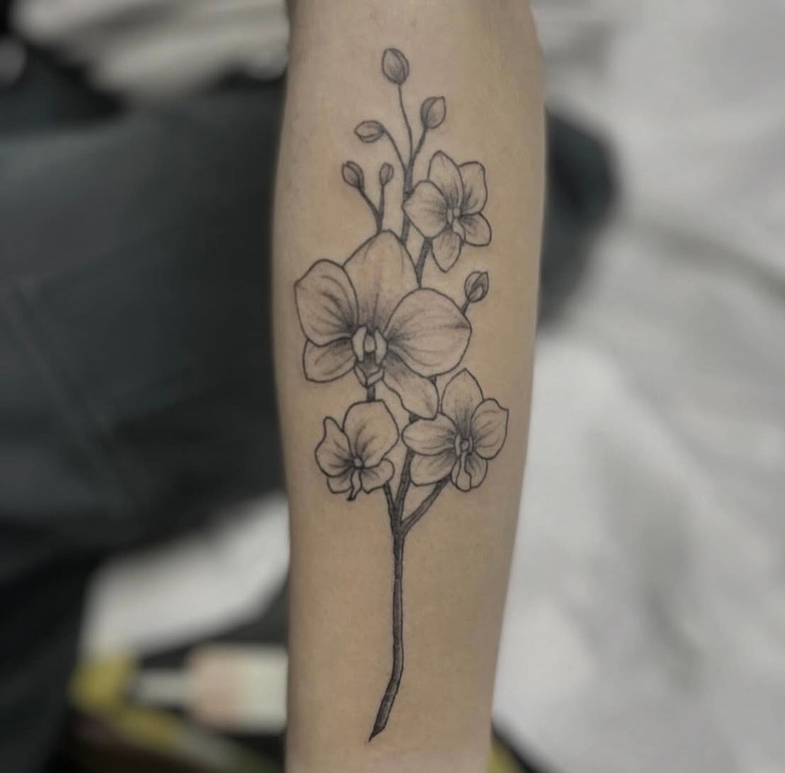 Orchid tattoo by Jess Alther at Black Gold Tattoo Co in Edmonton Alberta Canada